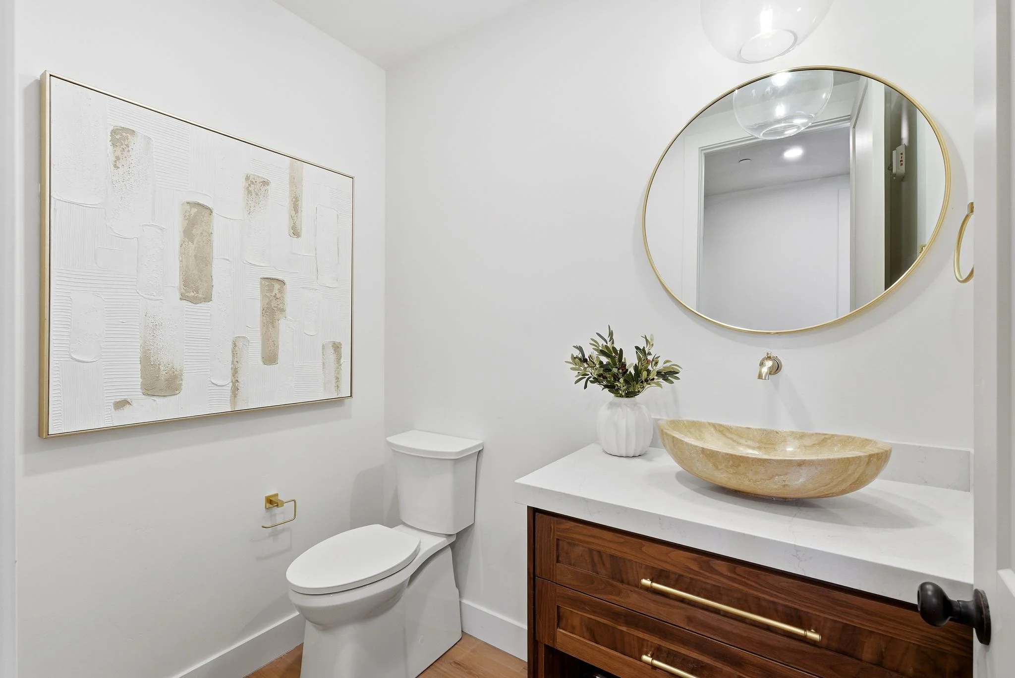 Powder bathroom with feature wall